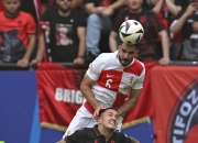 爱游戏官方-阿尔巴尼亚国家队在艰难比赛中获胜，晋级正赛